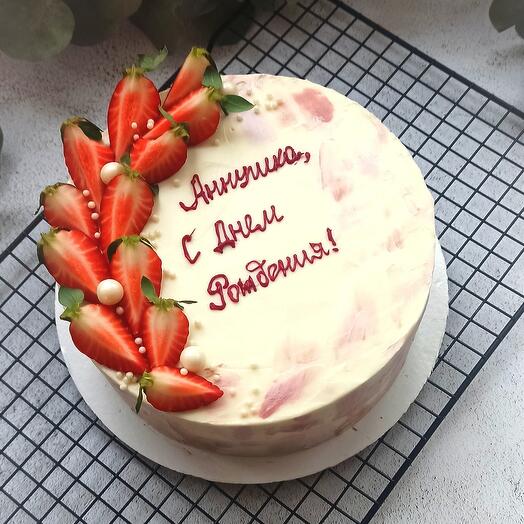Carrot cake with pecans and prunes for a birthday (the inscription can be any)