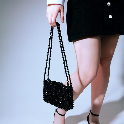 Чёрная блестящая сумка