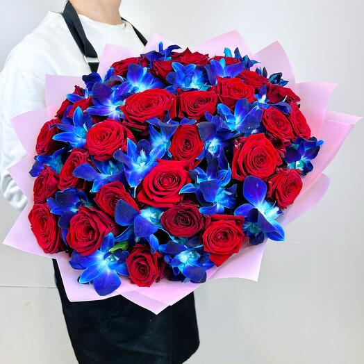 Cosmic bouquet of roses and blue orchids