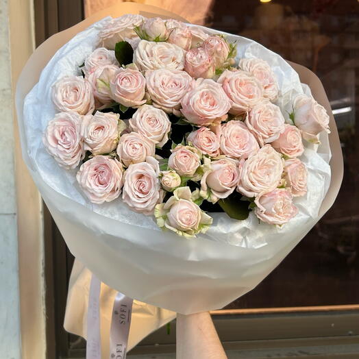 Monobucket of bushy peony-shaped pale pink roses