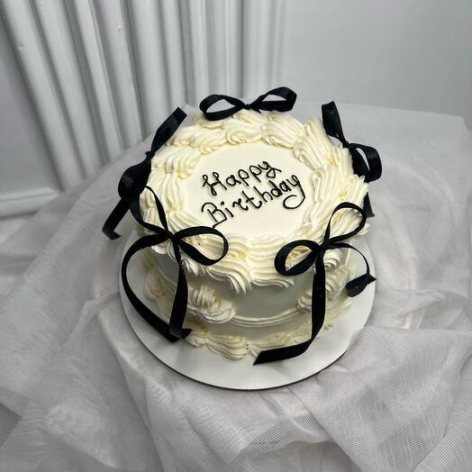 Happy birthday cake with bows