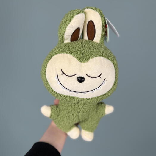 Игрушка зеленая
