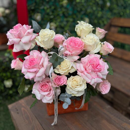 Roses in a Woven Bag