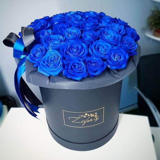 Blue roses in a box