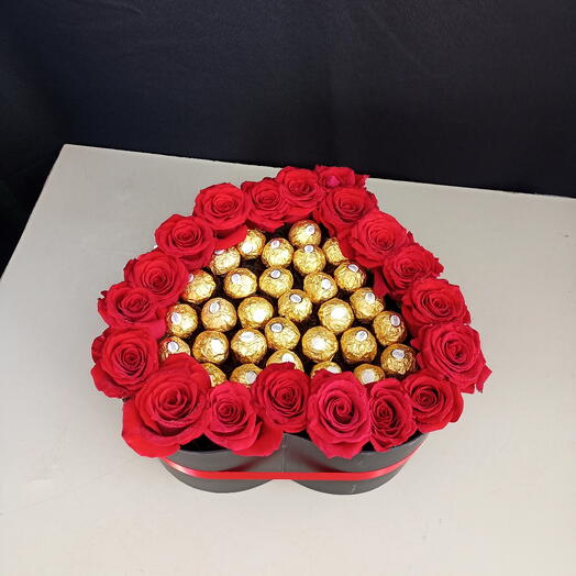 Box arrangement with flowers and chocolate