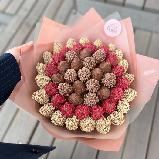 A luxurious bouquet with chocolate-covered strawberries