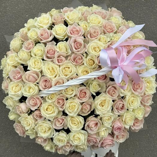 White and pink roses in basket