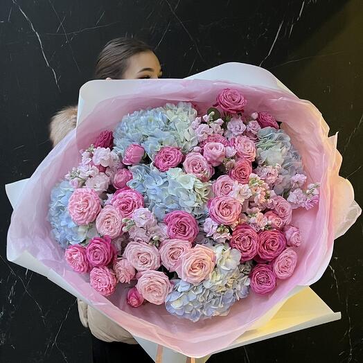 A large fragrant bouquet with mattiola, bushy peony-shaped rose and lush hydrangea