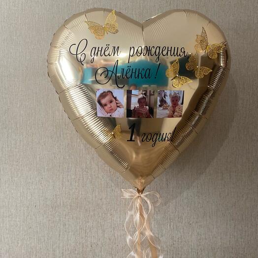 A heart with a photo and your custom message for the first year anniversary.