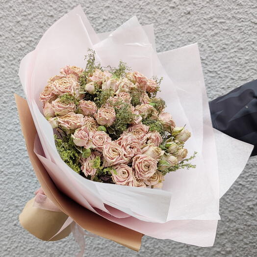A delicate bouquet of dried rose sprays