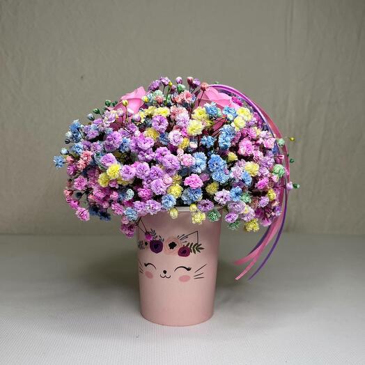 Rainbow gypsophila with a soap rose in a cup