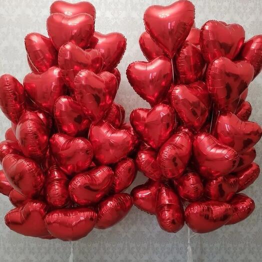 Фонтаны любви: 100 красных фольгированных шаров-сердец