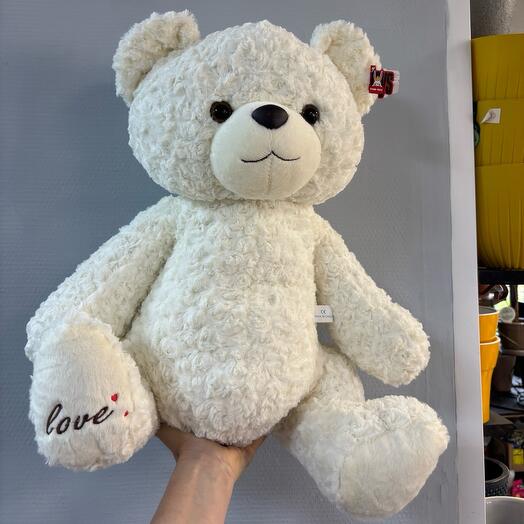 Мягкий плюшевый мишка