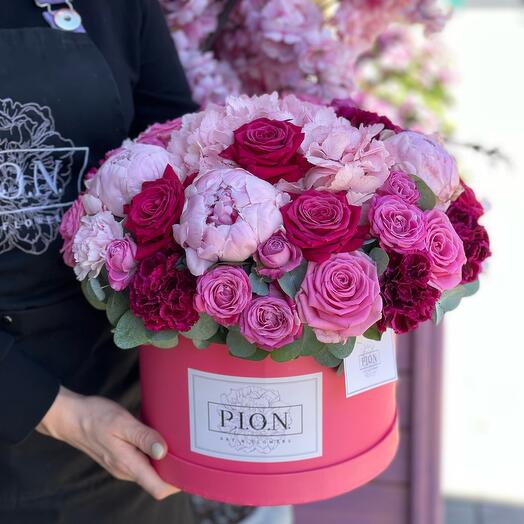Flowers in a box with peonies