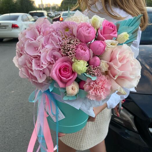 Flowers in a box with roses