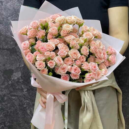 A bouquet of pale pink, bushy roses