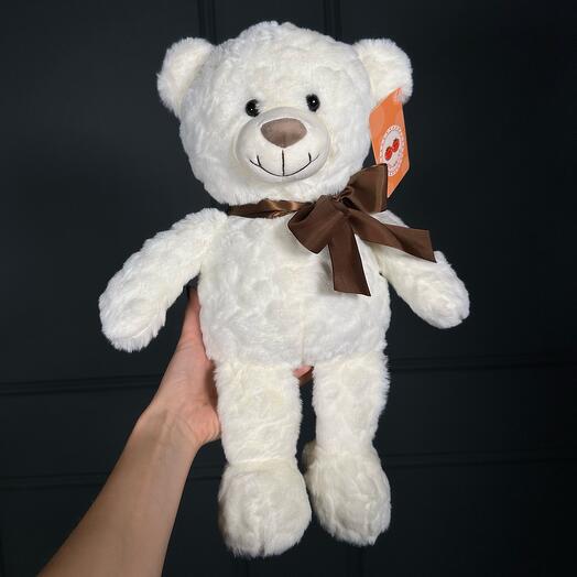 Игрушка мягкая Мишка маленький белый с коричневым бантом