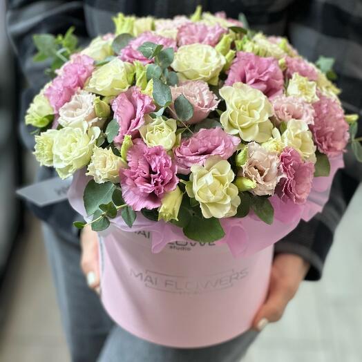 A box of bush roses and eustoma
