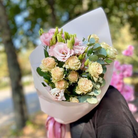Bouquet of eustoma and bushy peony-shaped roses with eucalyptus