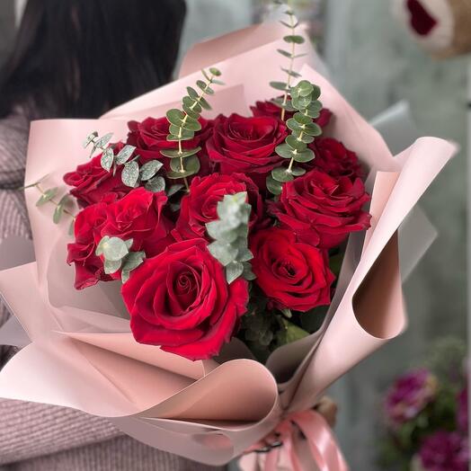A beautiful mono of red rose and eucalyptus