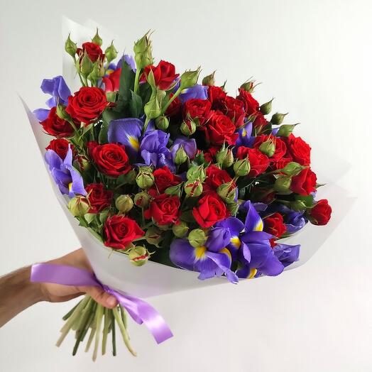 Bouquet of irises and bush roses