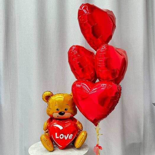 Oso de peluche con bolas de amor
