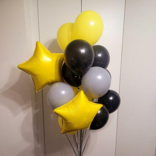 A bunch of black and yellow balls Delight