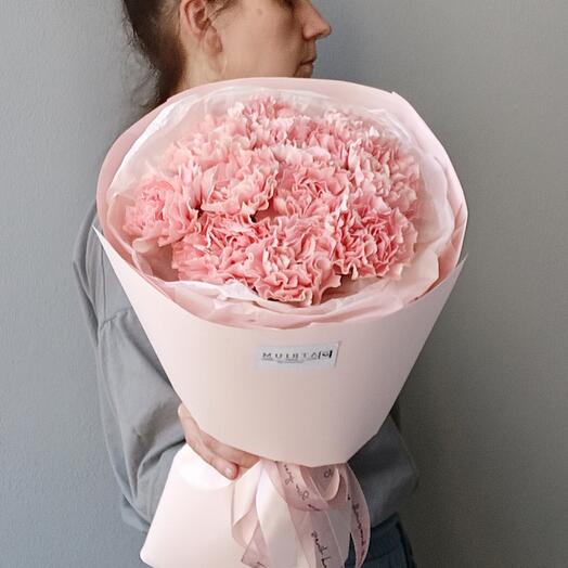 Delicate bouquet of pink carnations