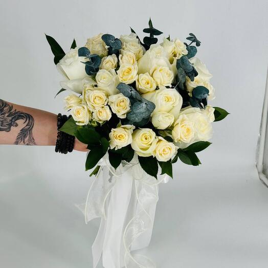The bride's bouquet of white roses