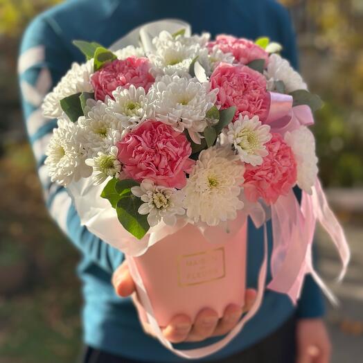 Flowers in a box. Dianthus, chrysanthemum bush , eucalyptus