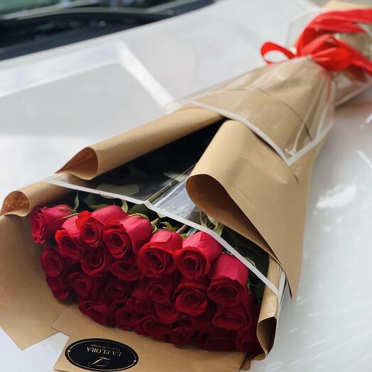 25 red roses in craft wrapp
