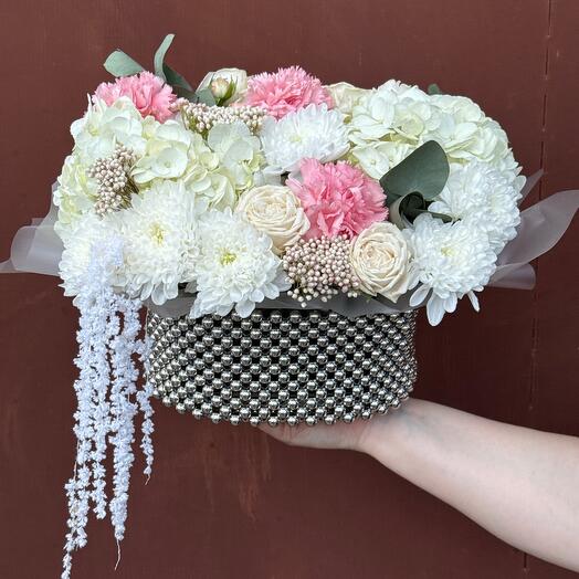 A gorgeous composition in a basket of beads