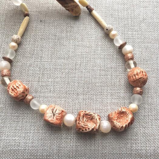 Beads made of polymer clay, bones