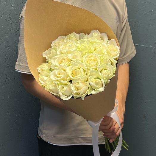 White roses in craft paper