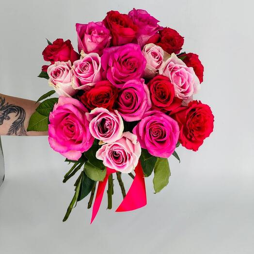 Flowers multicolored pink roses in a bouquet without packaging