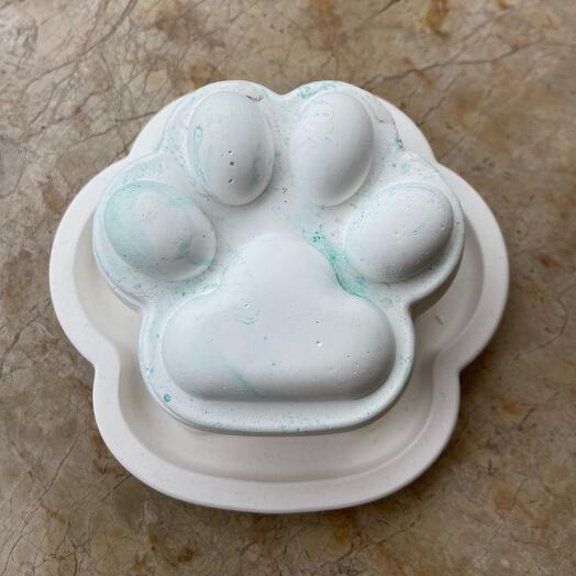 Candle and cat's paw stand