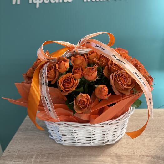 Basket with orange bush roses