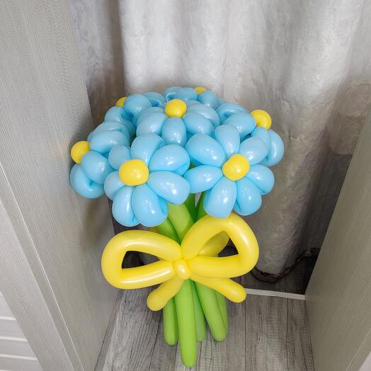 A bouquet of 7 blue daisies. Balls balls