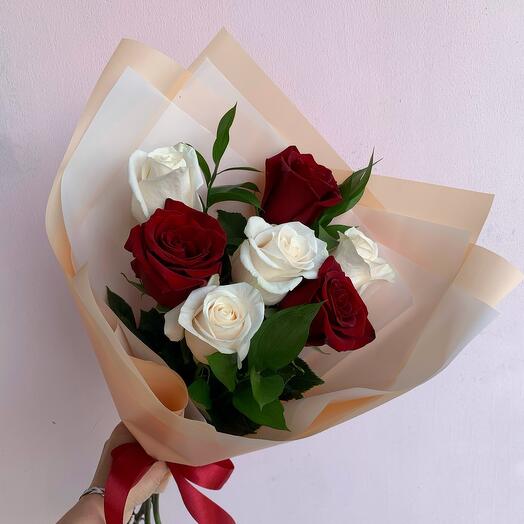 7 red and white roses with decoration