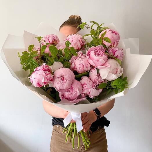Bouquet of 19 pink peonies and raspberry twigs