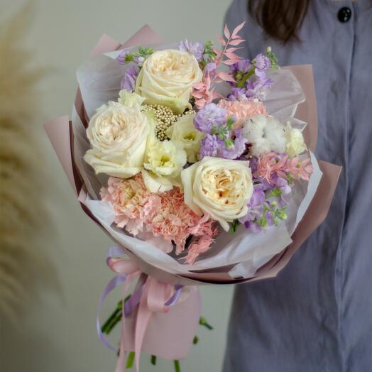 Bouquet of peony roses, mattiola, dianthus with cotton