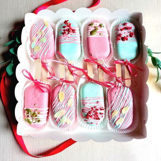 A set of cheesecakes on a stick as a gift to your sister, mom, girlfriend, beloved (mango, strawberry, caramel, chocolate)