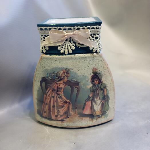 A jar in the decoupage technique
