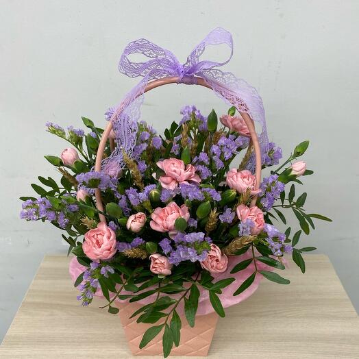 Flowers in a box of dianthuses and statice