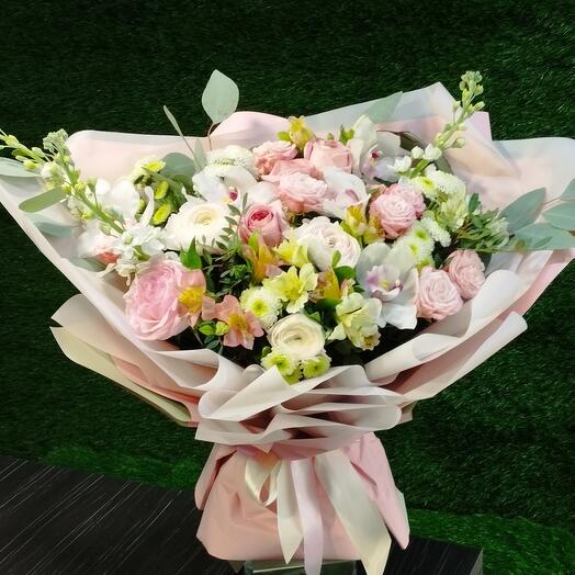 Bouquet with cymbidium and ranulucuses