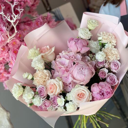 Bouquet of roses with peony roses and ranunculus