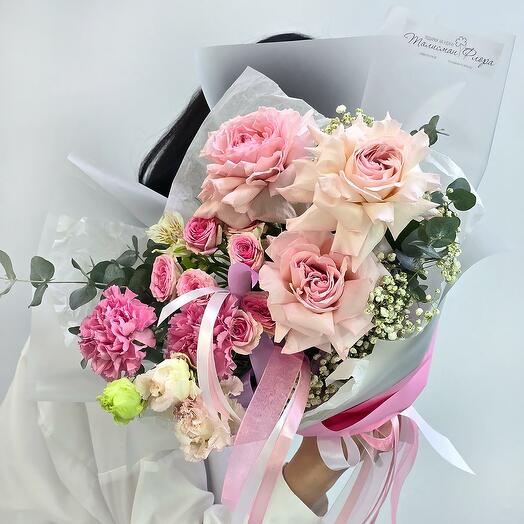 Pink tenderness bouquet of peony-shaped roses in a package