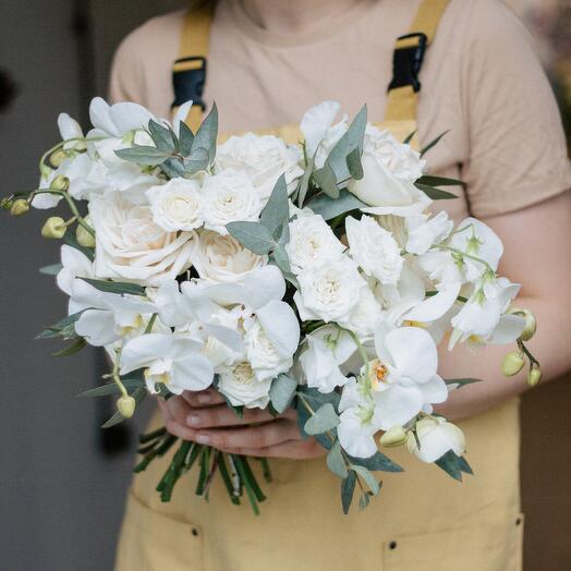 Wedding bouquet with orchids, eucalyptus and roses