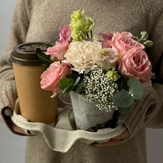 Composition with fresh flowers and coffee