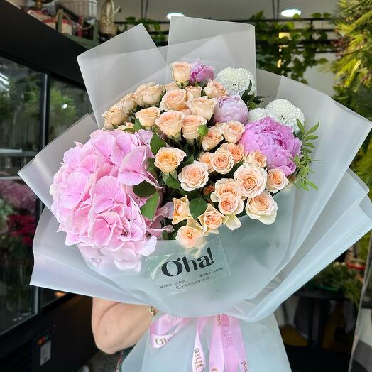 Bouquet with peonies, hydrangea and sprey roses